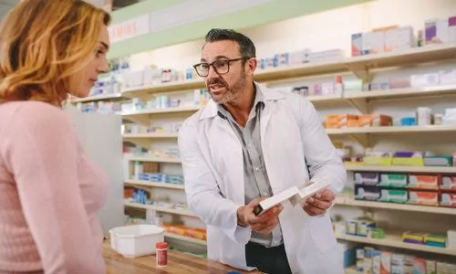 Pharmacist helping a customer