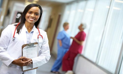 Smiling doctor working in hospital